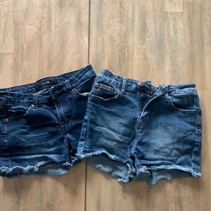 2pairs of girls cut off shorts